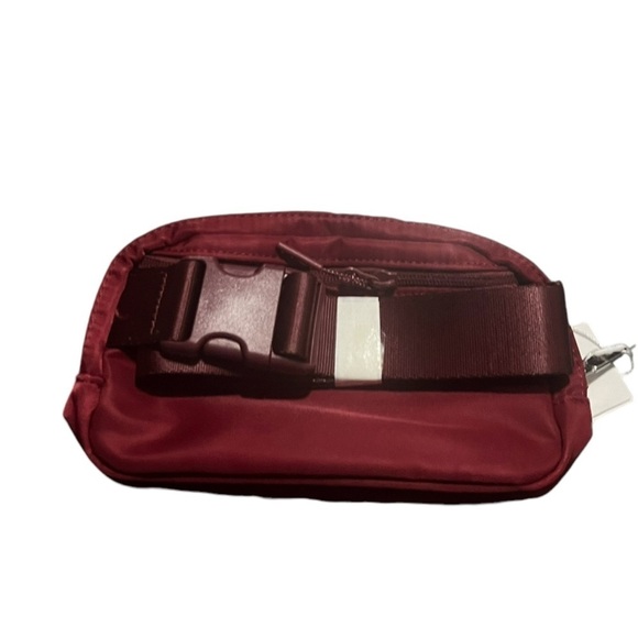 lululemon belt bag large logo Everywhere  The Shop at Equinox Interior pockets hold the essentials NWT Unisex Lululemon Everywhere Belt
